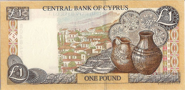 один кипрский фунт с изображением деревни Като Дрис